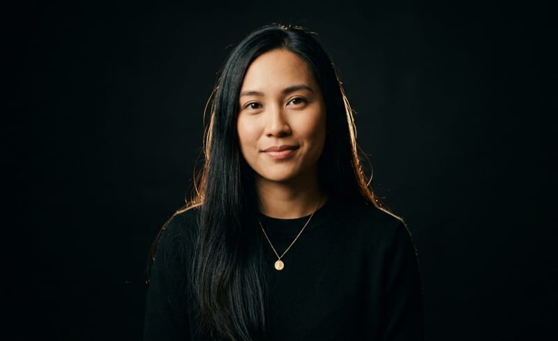 Reservations — portrait in black sweater